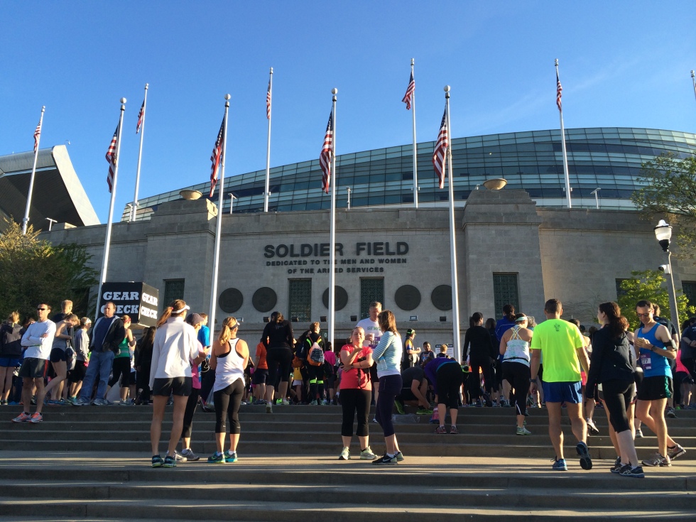 Runners gathering on the steps of Soldier Field before the Solider Field 10 Mile race.